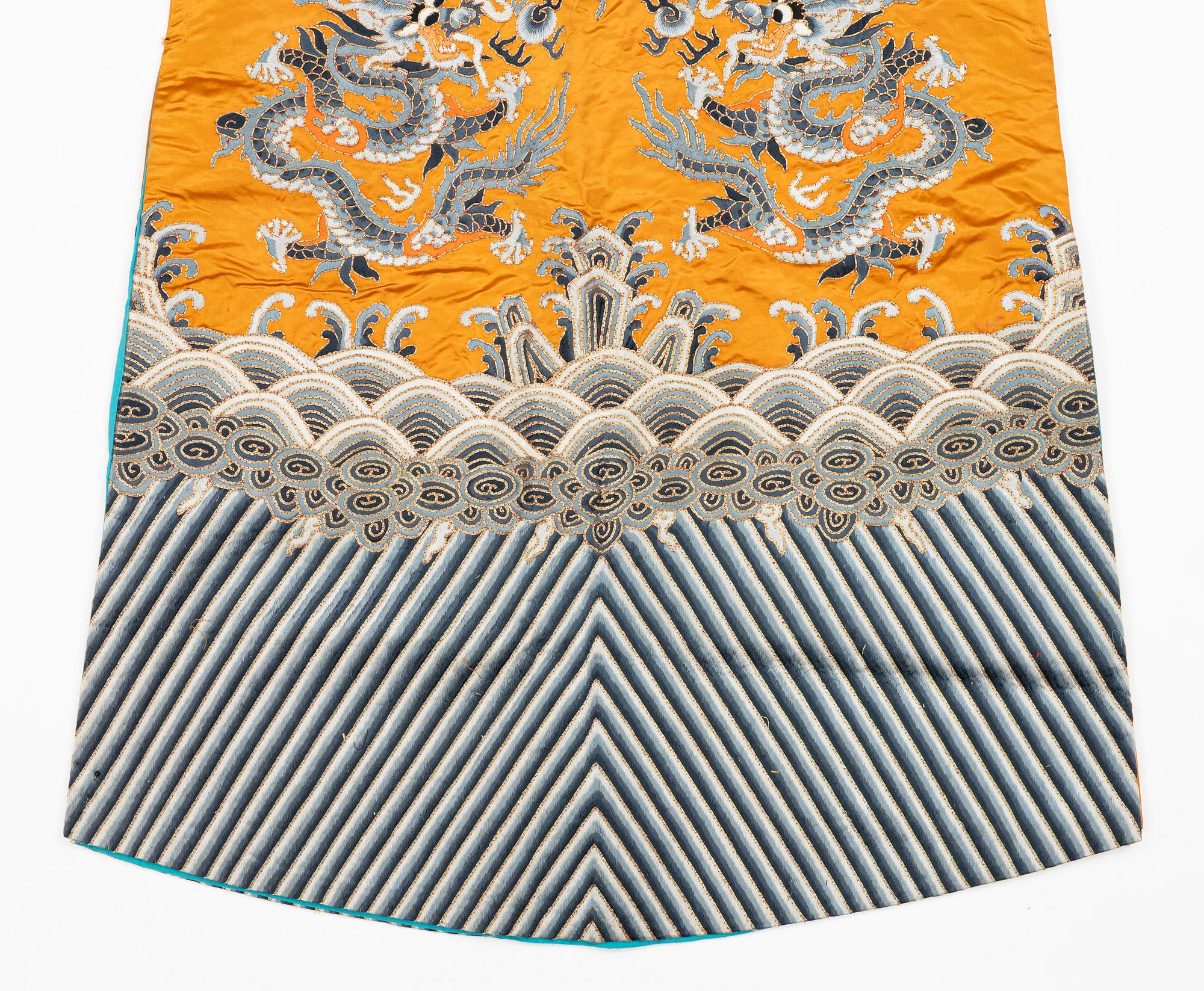A Chinese embroidered silk robe, 20th century.