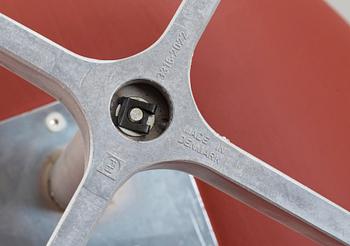 A pair of Arne Jacobsen red leather 'Swan' chairs, Fritz Hansen, Denmark 2001.