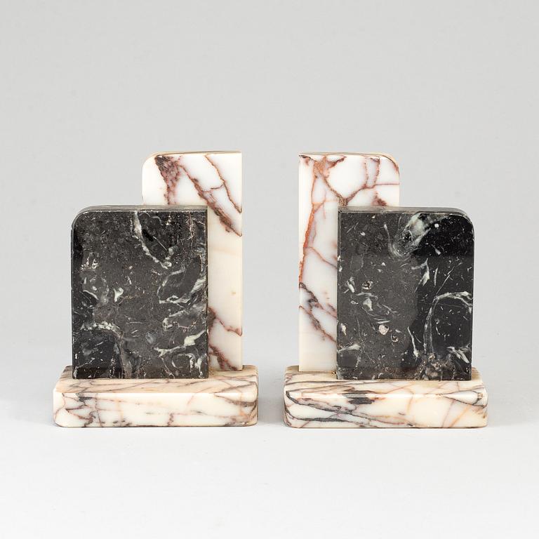 A pair of art déco marble book ends, 1930s.
