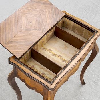 A Louis XV style table, circa 1900.