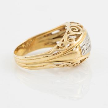 14K gold and brilliant cut diamond ring.