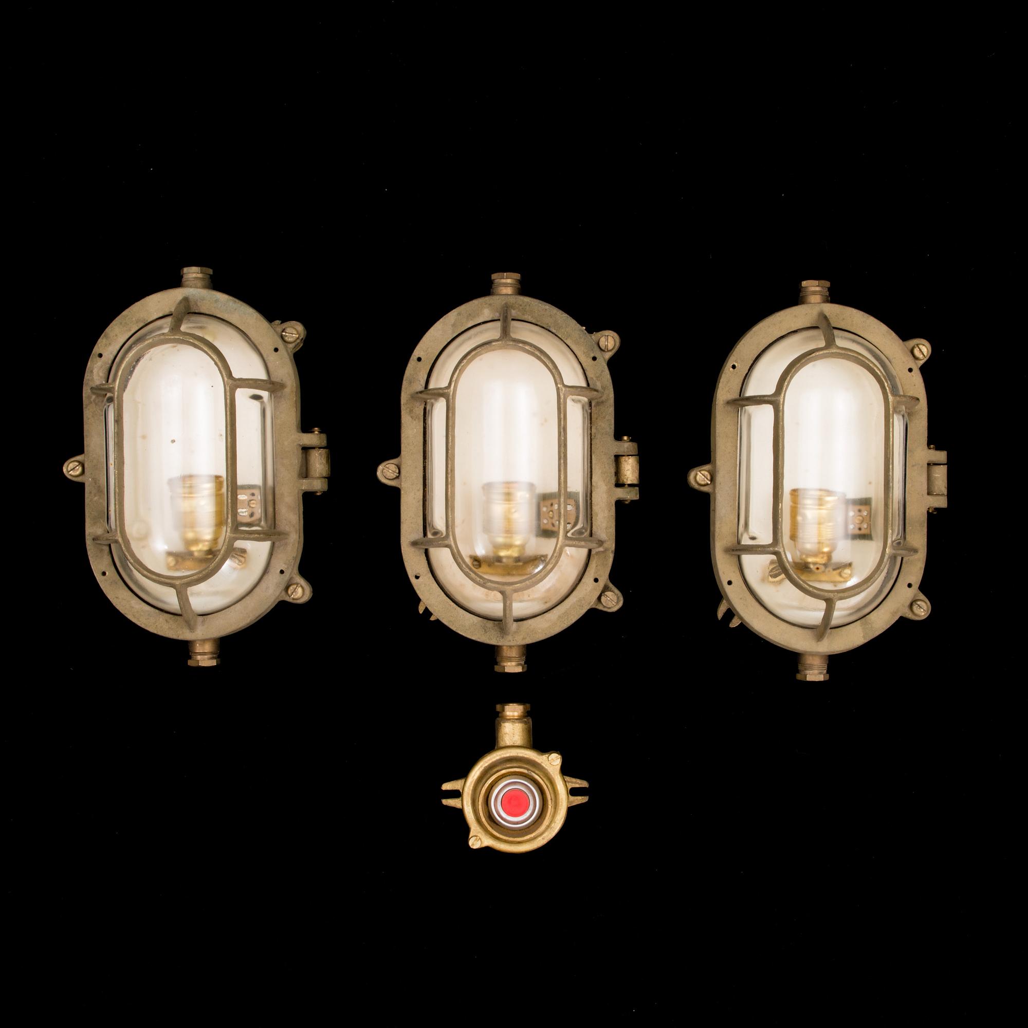 A set of three lights and a switcher from the latter half of the 20th century.