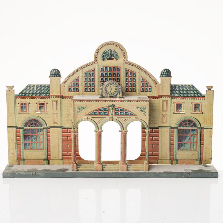 Model train with track and station building, 13 pieces, Germany, 1920s.