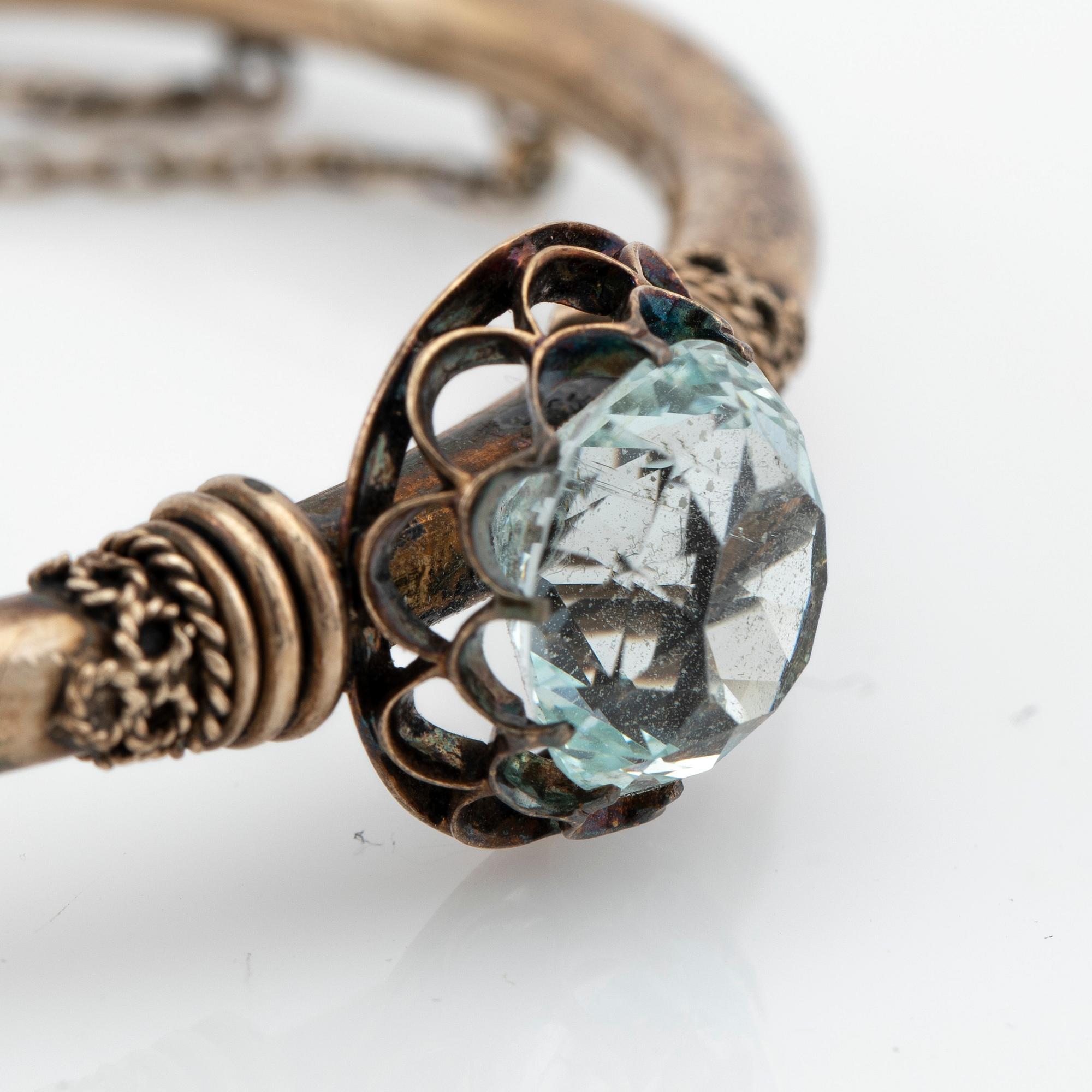 Arm ring, silver with aquamarine.