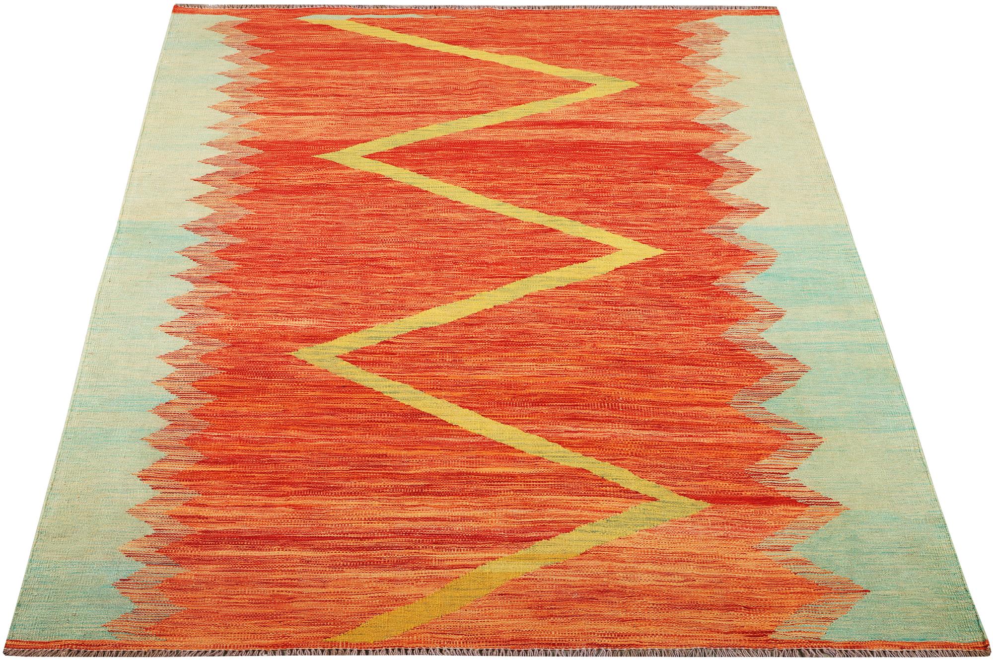 A Kilim rug, a. 246 x 174 cm.