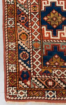 A rug, antique Bergama, ca 199-202 x 154-158 cm (and 2,5-3 cm "flat weave" at the ends),