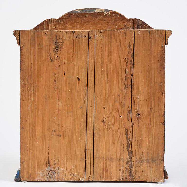 Hängskåp, allmoge, av Jöns Månsson, Forsa, Hälsingland, märkt JSS 1792.
