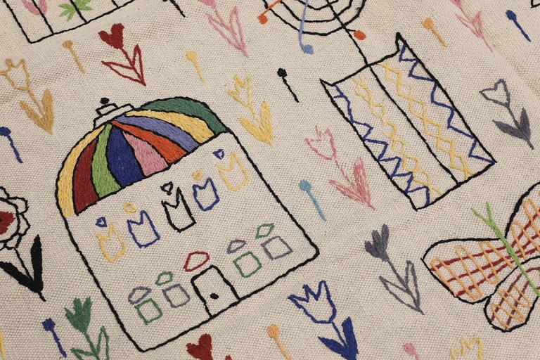 A Kilim carpet with hand-embroidered decoration, 239 x 182 cm.