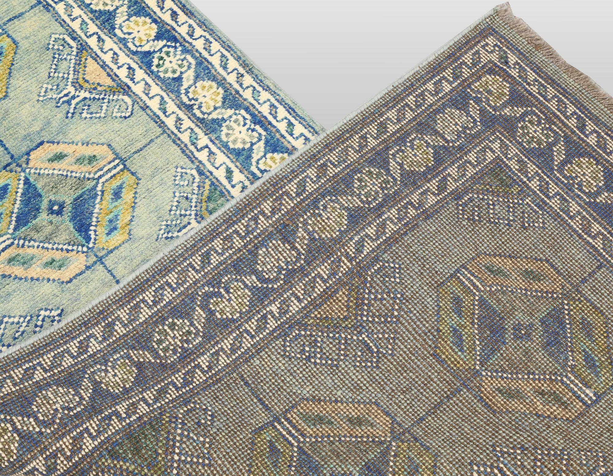 An Oriental runner, c. 296 x 77 cm.
