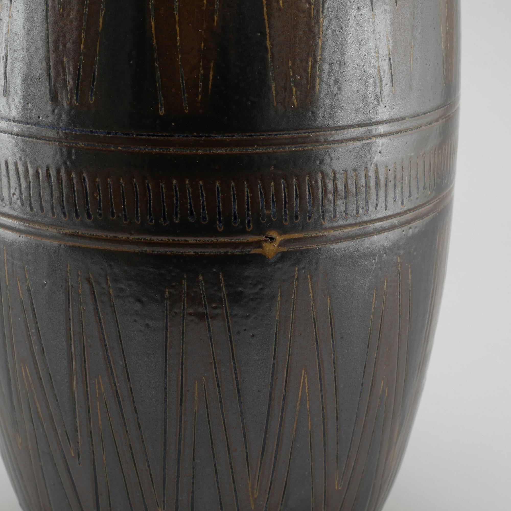A mid 20th century floor vase in stoneware by by Arthur Andersson fr Wallåkra Lerkärlsfabrik.