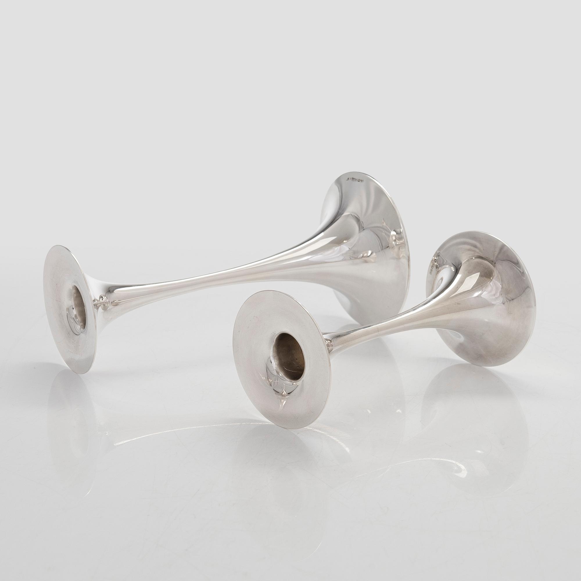 Tapio Wirkkala, A set of four silver candlesticks, "Trumpetti", Kultakeskus, Hämeenlinna 1979 and 1990.