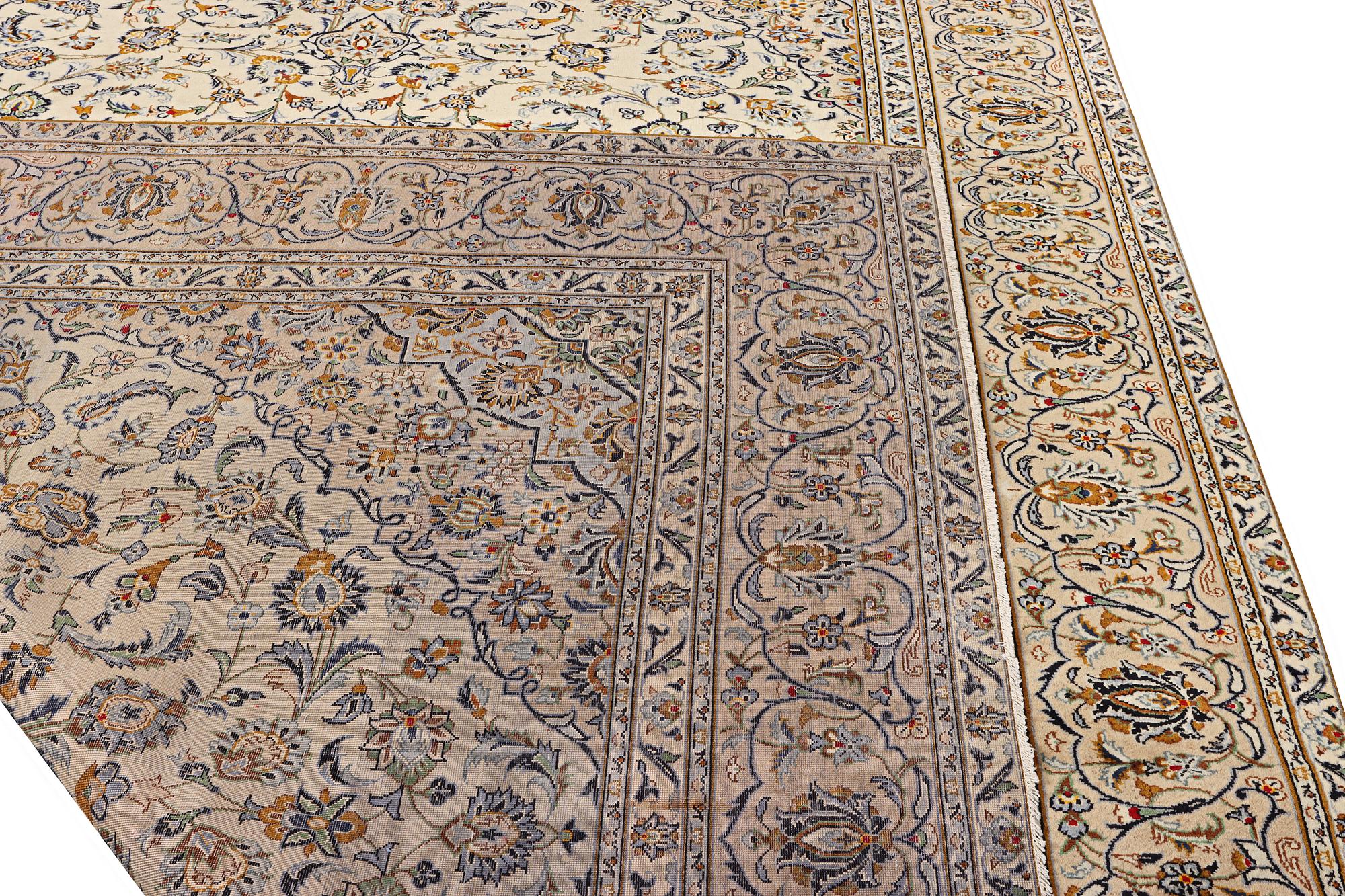 A Kashan carpet, c. 388 x 285 cm.