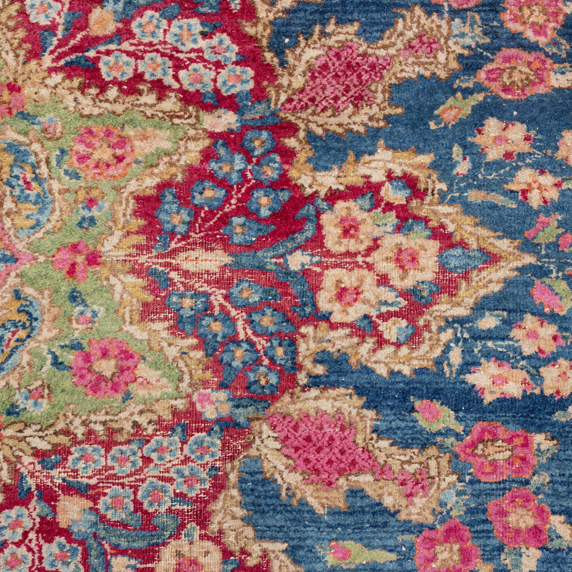 A carpet, Kerman, ca 358 x 275 cm.