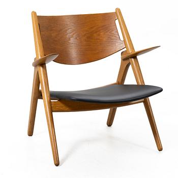Hans J. Wegner, Armchair, “CH-28”, Carl Hansen & Søn, Denmark, second half of the 20th century.