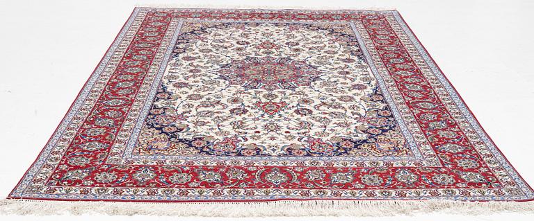 An oriental carpet, c. 310 x 200 cm.