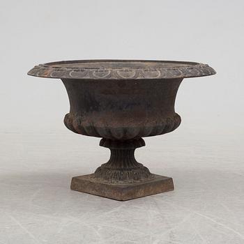 An early 20th century iron garden urn.