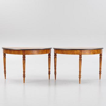 A birch veneered dining table, second half of the 19th Century.