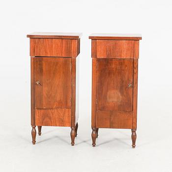 A pair of walnut Louis XVI style bedside tables first half of the 20th century.