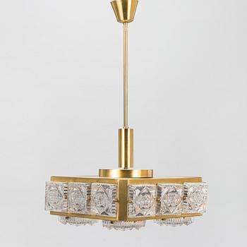 A pendant ceiling light from the 1970s-80s.
