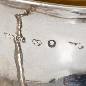 Two jugs and a pair of candlesticks, CG Hallberg among others.