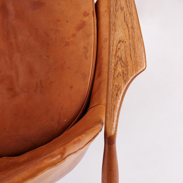 Ib Kofod Larsen, a pair of teak and cognac coloured leather "Sälen" easy chairs, Olof Perssons Fåtöljindustri (OPE), Sweden, 1950-60's.