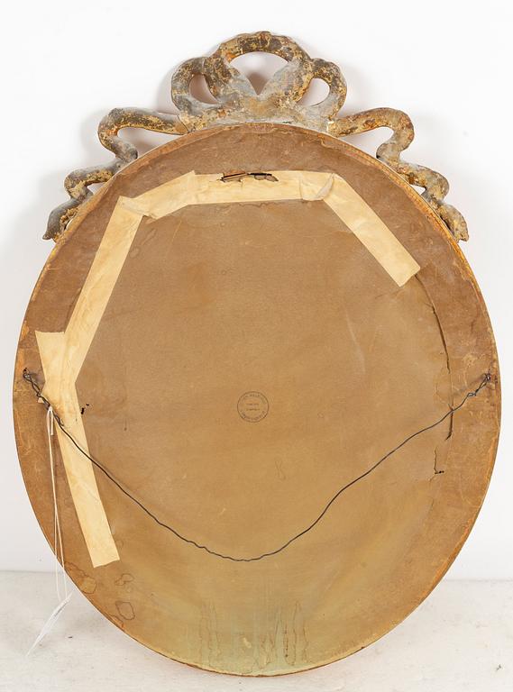 A gustavian style mirror, first half of the 20th century.