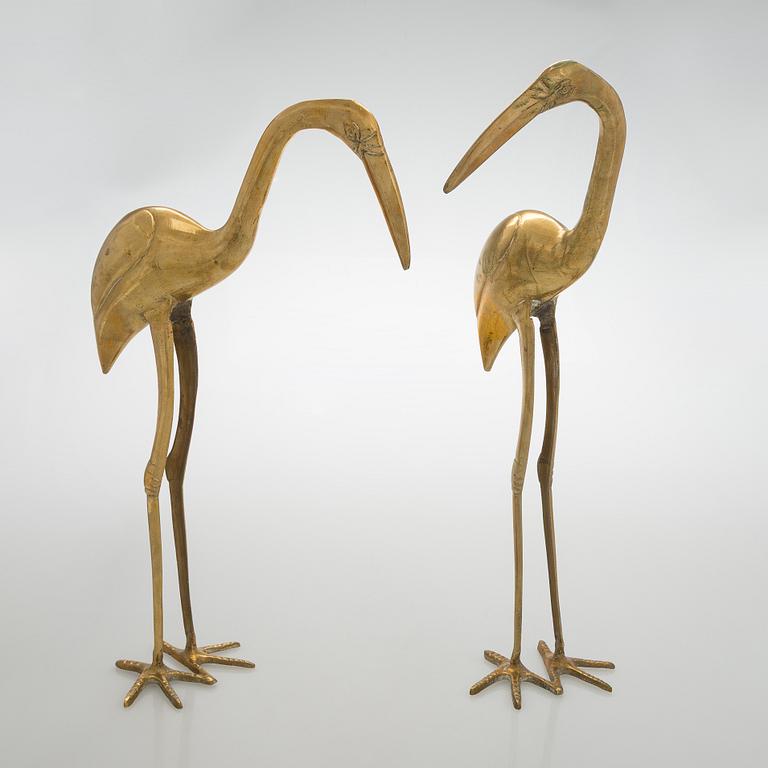 A pair of brass figurines, 20th/21st century.