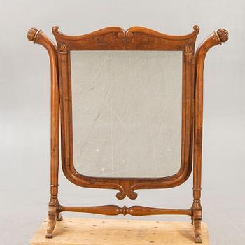 A late 19th century walnut floor mirror.