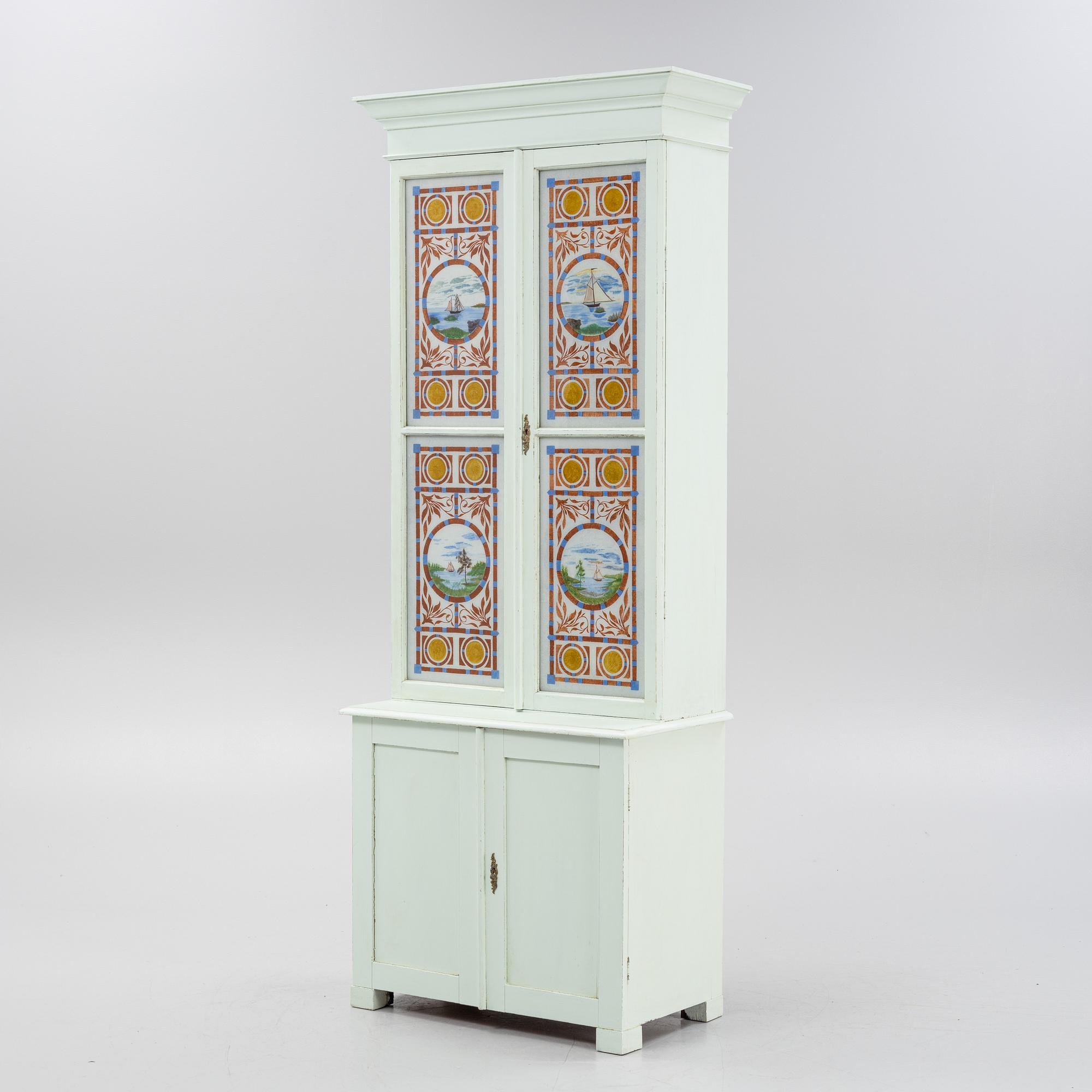A painted cabinet, circa 1900.