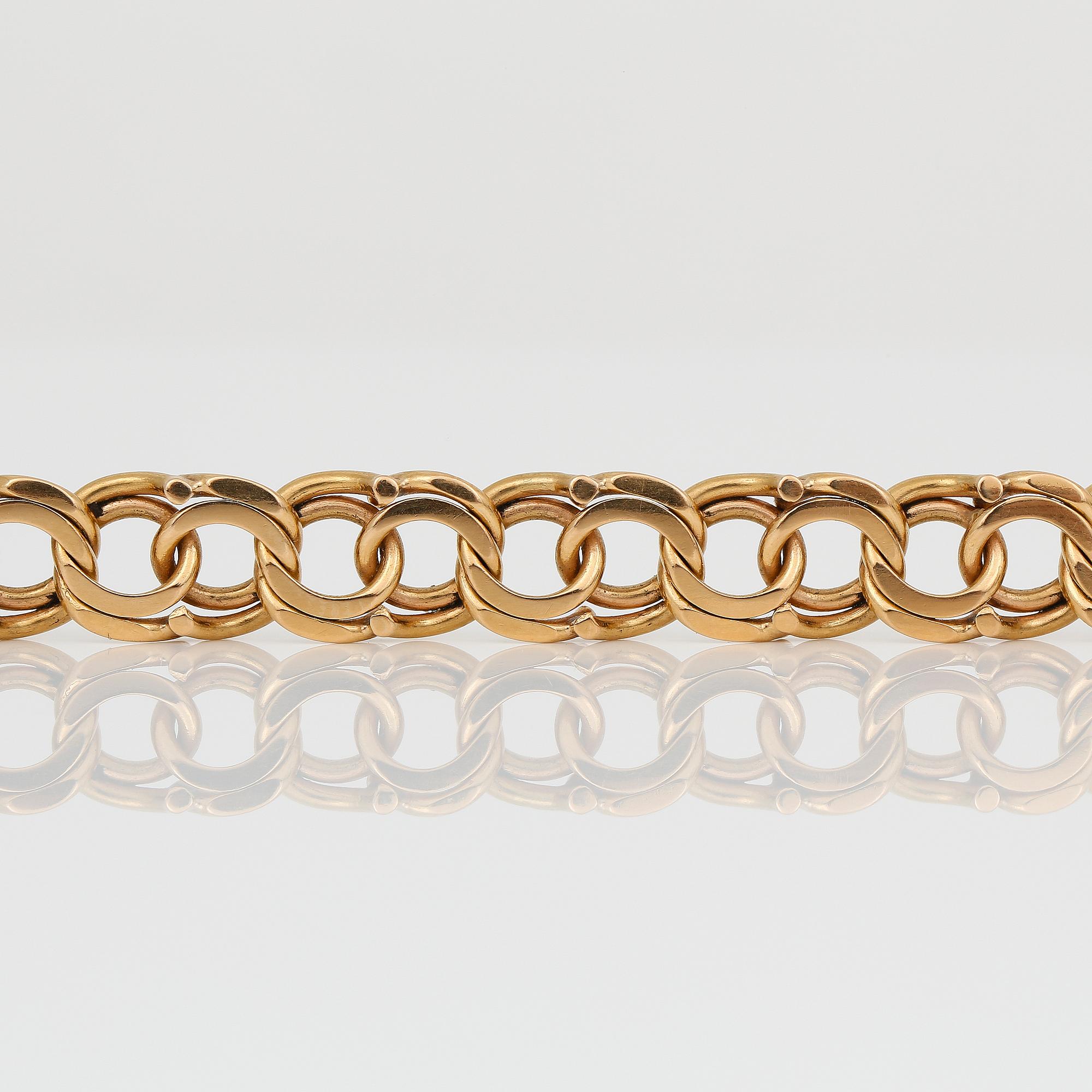 ARMBAND, 18K guld. Vikt ca 21,95 g.