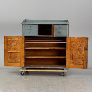 A mid 19th century painted cupboard.