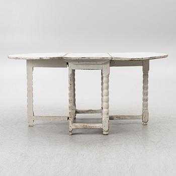 A drop-leaf table, 19th century.