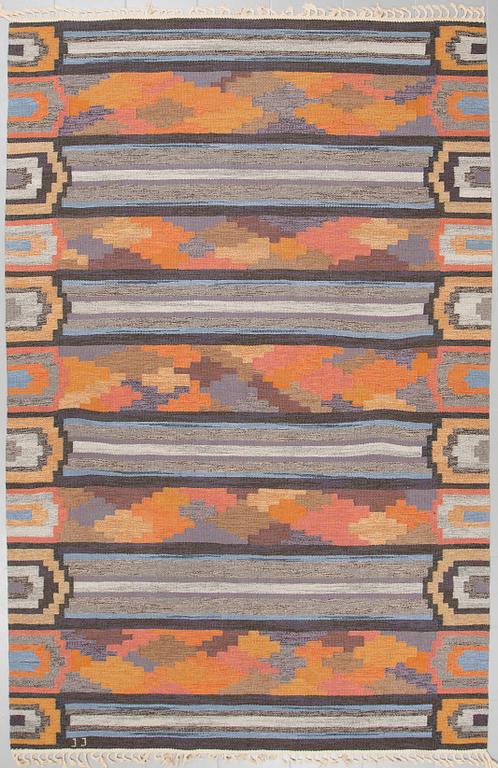 a flatweave, signed JJ, designed 1962, ca 303 x 199 cm.