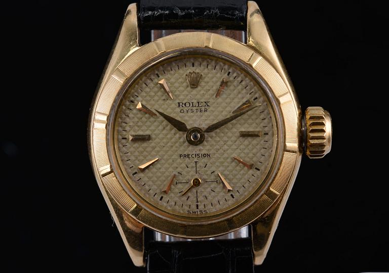 A LADIES WATCH, Rolex Oyster Precision 1960 s. 18K gold. Wristband has been changed. Original clasp included.