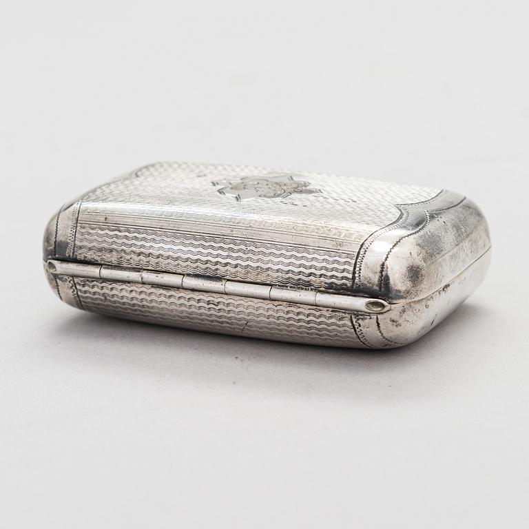 A Russian, parcel-gilt silver cigarette case, maker's mark of Karl Verlin, Saint Petersburg 1871-1878.