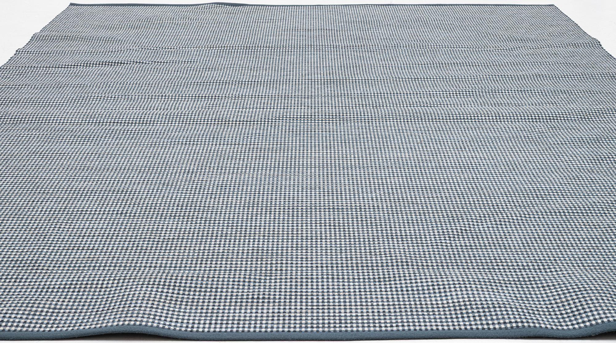 Gunilla Lagerhem Ullberg, a flat-woven 'Häggå' carpet, Kasthall, 2021, ac. 370 x 310 cm.
