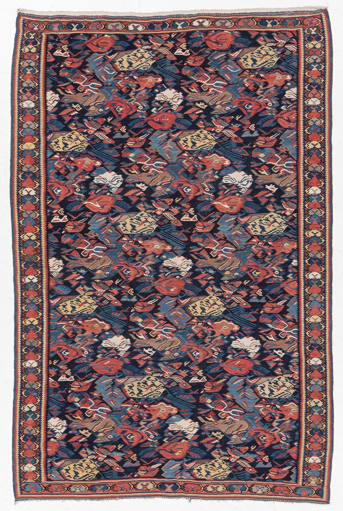 A Kilim rug, Senneh, approx. 199 x 132 cm.