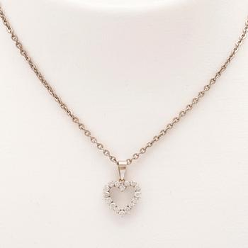 An 18K white gold pendant set with round brilliant cut diamonds.