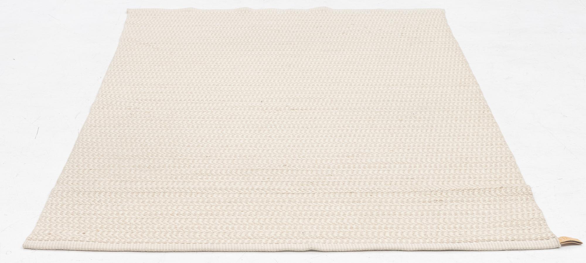 A 'Häggå' rug, Kasthall, approx. 204 x 127 cm.