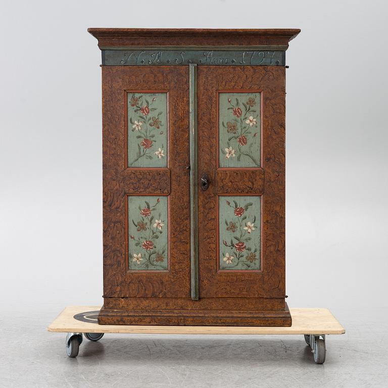 A Swedish painted cabinet,  marked 1797.