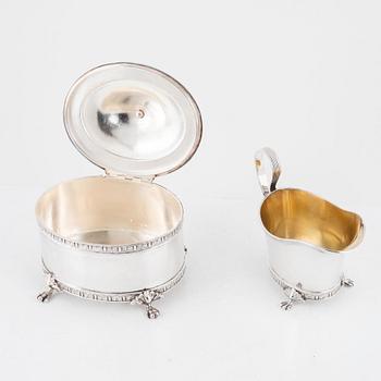 A Swedish silver sugar box and creamer, marks of Jacob Engelberth Torsk, Stockholm 1902.