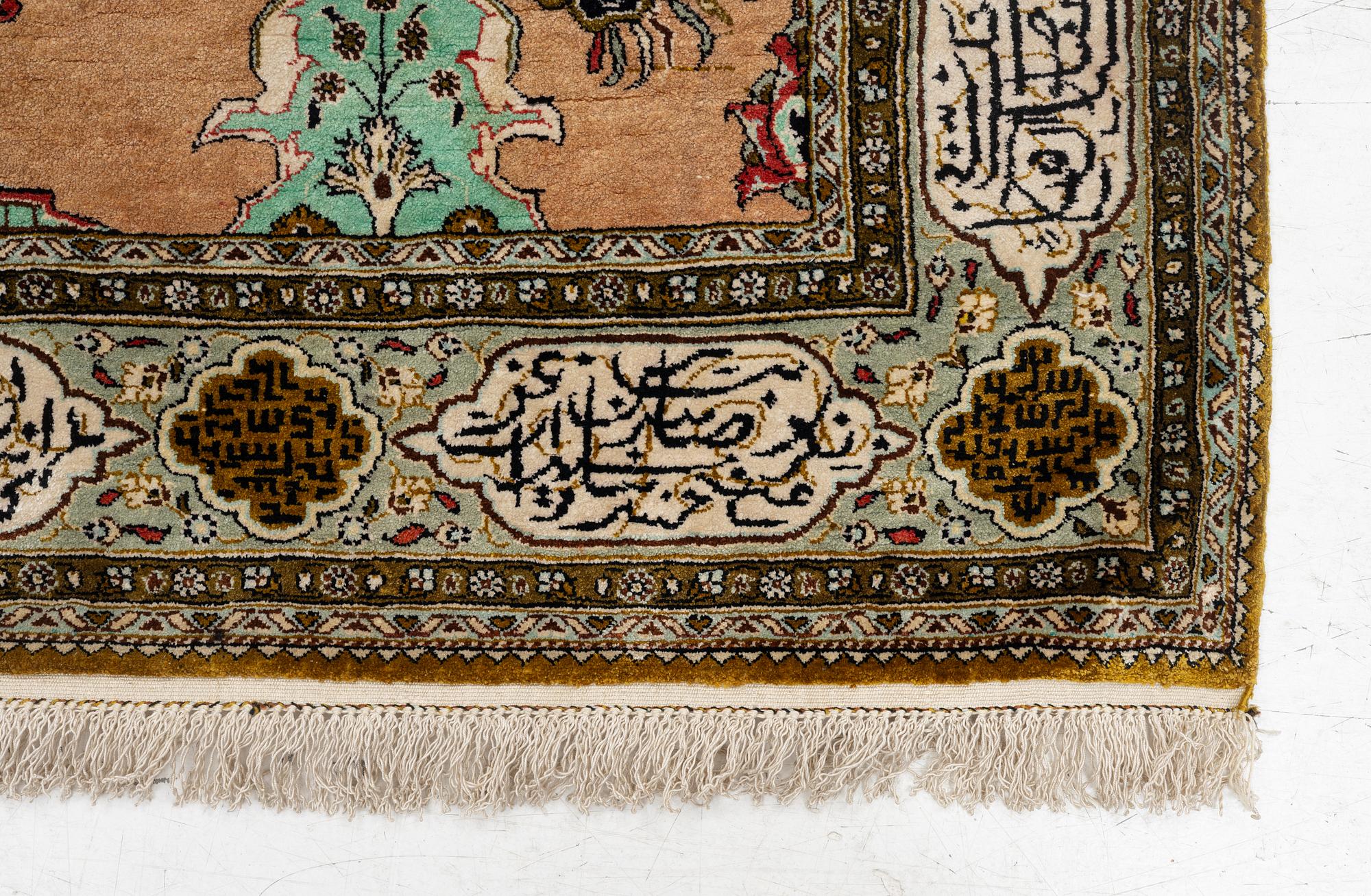 A silk Quum rug, c. 155 x 103 cm.