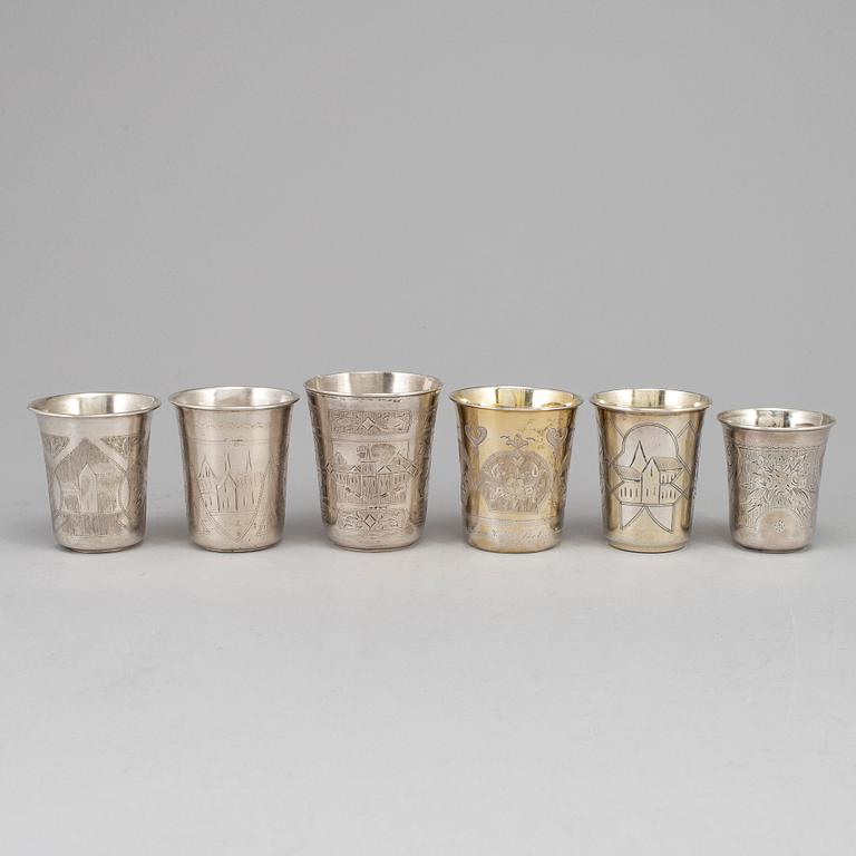A set of six Russian 19th century parcel-gilt silver vodka cups.