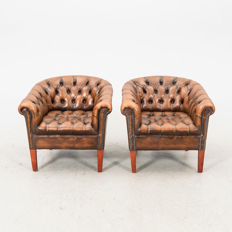 A pair of leather armchairs. second half of the 20th century.