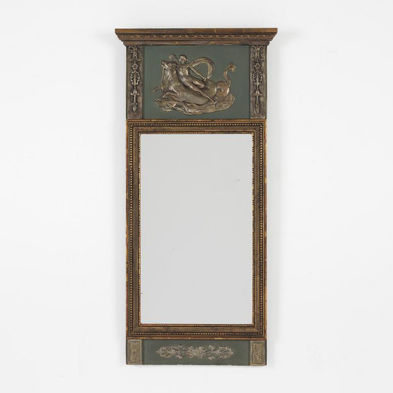 An Empire style mirror, first half of the 20th century.