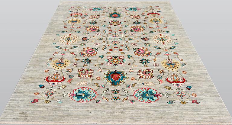 A rug, of 'Ziegler' Design, c 238 x 164 cm.