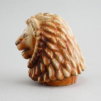 A stoneware figurine, designed by Gunnar Nylund for Rörstrand in the mid 20th century.