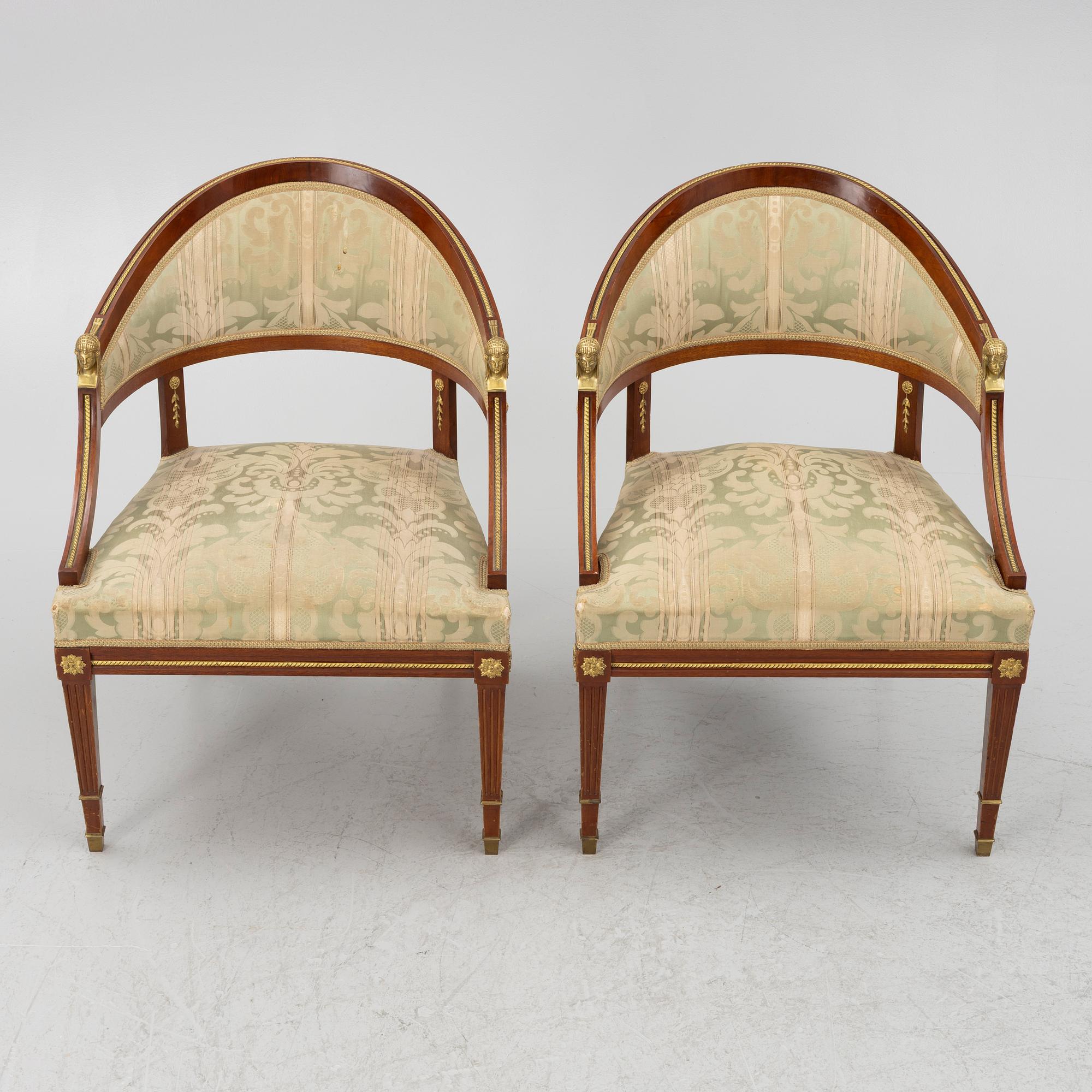 A sofa, two armchairs, four chairs and table, Empire style, 20th century.
