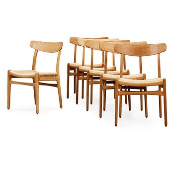 104. A set of six Hans J Wegner 'CH-23' oak dining chairs, Carl Hansen, Odense, Denmark.