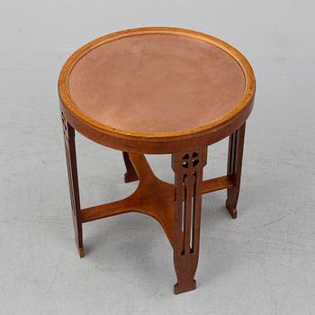 A copper and mahogany table by Nordiska kompaniet.